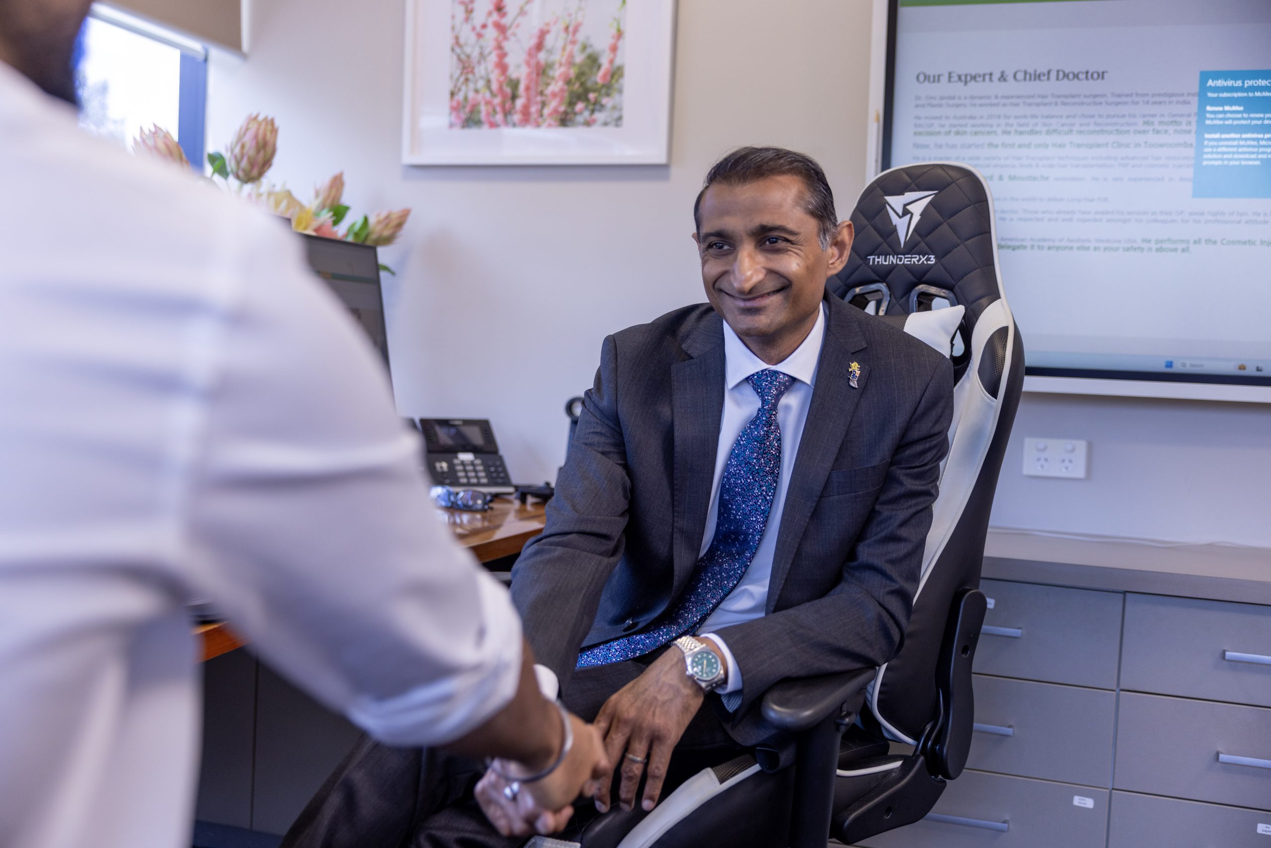 OJ Clinics doctor greeting a patient